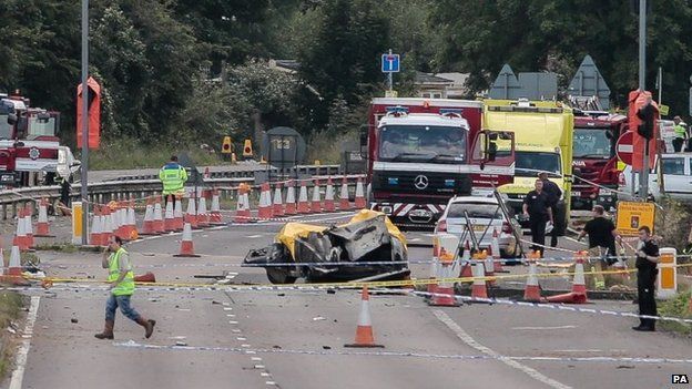 Emergency services attend the scene on the A27