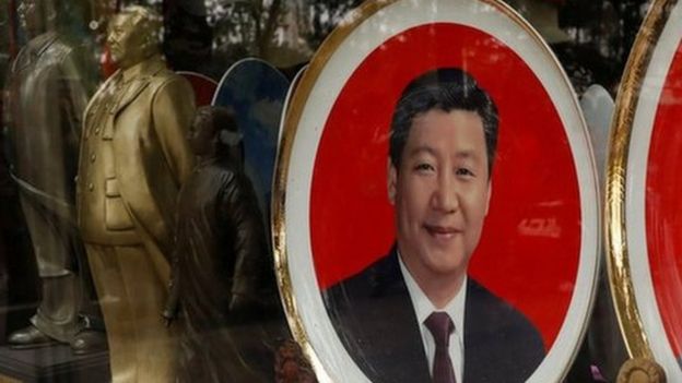 Souvenir plates with images of Chinese late Chairman Mao Zedong and Chinese President Xi Jinping.