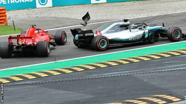 Sebastian Vettel's Ferrari collides with Lewis Hamilton's Mercedes at Monza this year