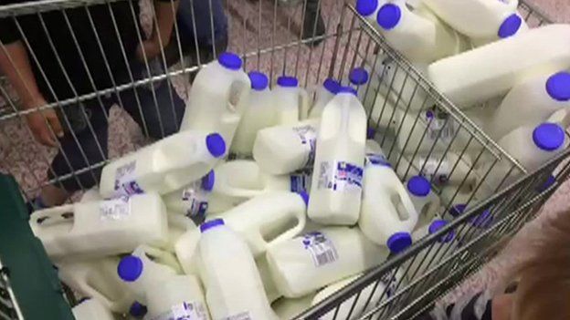 Milk cartons in a trolley