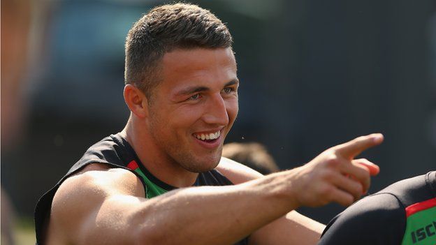 Sam Burgess shares a laugh with team mate during a South Sydney Rabbitohs NRL training session at Redfern Oval on September 10, 2013 in Sydney, Australia.