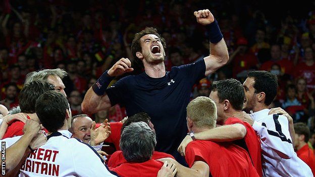 Andy Murray is hoisted into the air by his Great Britain team-mates