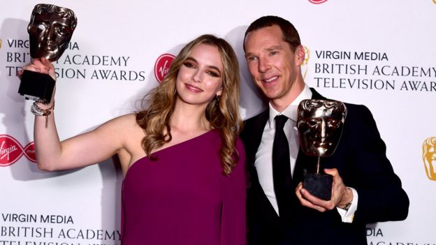 Jodie Comer and Benedict Cumberbatch with their Baftas
