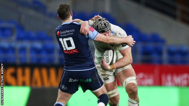 Dan Lydiate was yellow-carded for a challenge on Cardiff Blues number 10 Jason Tovey
