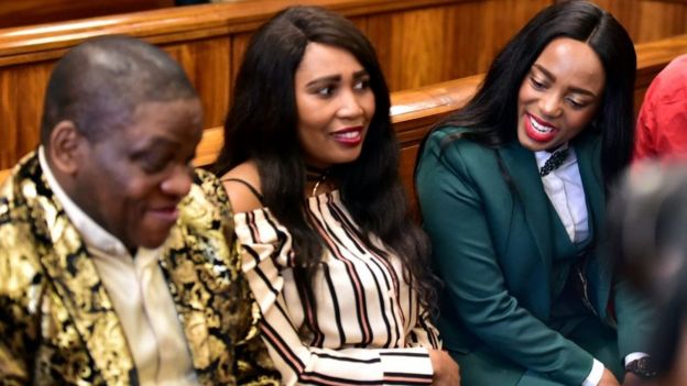 Controversial Nigerian pastor Timothy Omotoso and his co-accused Lusanda Sulani (36) and Zukiswa Sitho (28) during their appearance on charges of rape and human trafficking at the Port Elizabeth High Court on October 08, 2018 in Nelson Mandela Bay, South Africa