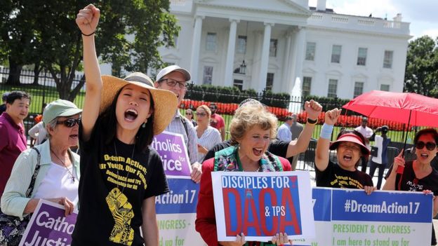 Protesters demonstrate in support of the Obama-era Daca immigration programme at the White House in Washington DC, 30 August 2017