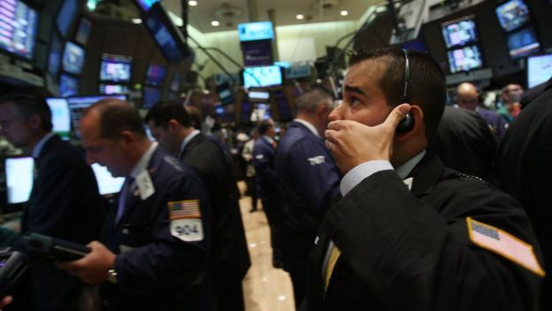 A trader looks anxious on the floor of the New York Stock Exchange on the day Lehman Brothers filed for bankruptcy