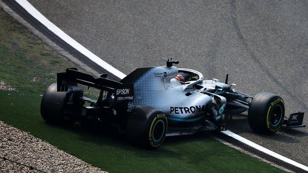 Lewis Hamilton spins off the track in Shanghai