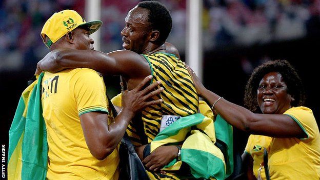 Usain Bolt and parents