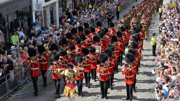 Band of the Grenadier Guards leading the Armed Forces Day Parade as it makes its way through Guildford