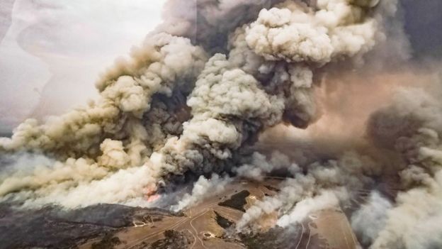 Aerial shot of huge clouds of smoke from the bushfire as it raced across Parndana, Kangaroo Island on 9 January