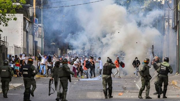 Venezuelan police clash with thousands of protestors