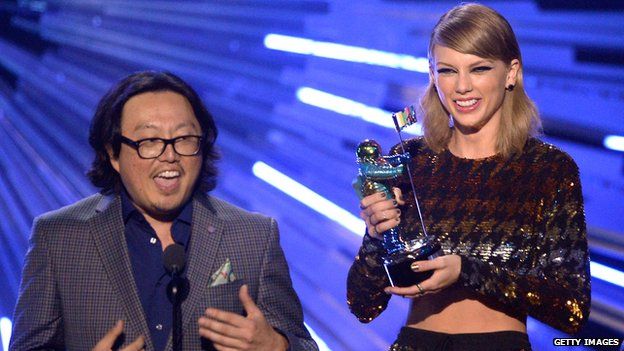 Joseph Kahn on stage with Taylor Swift at the MTV VMAs