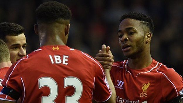 Jordon Ibe and Raheem Sterling celebrate with Liverpool