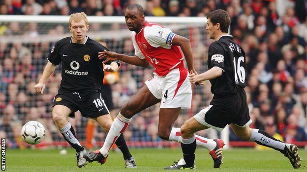 Patrick Vieira playing for Arsenal against Manchester United