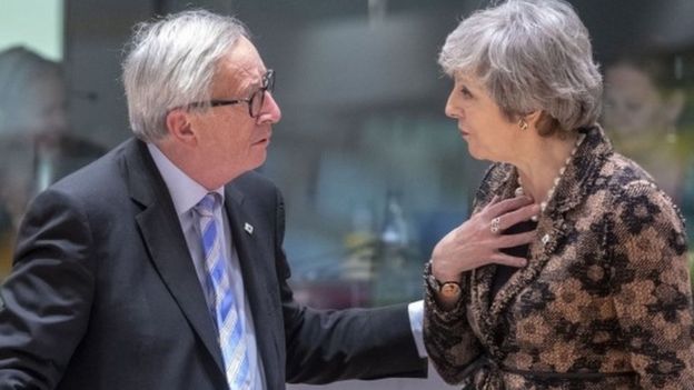 Jean-Claude Juncker and Theresa May (file picture)