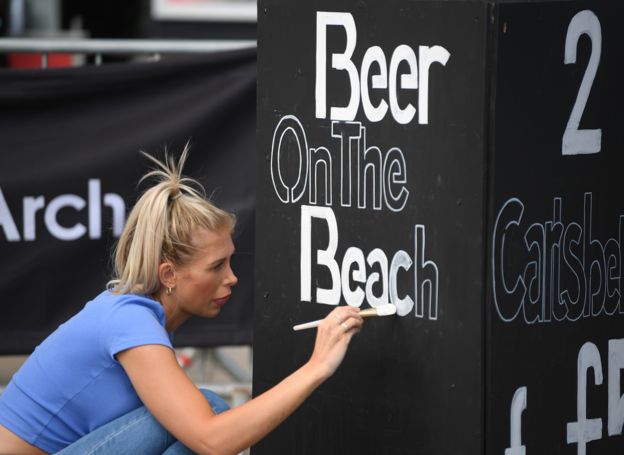 Signwriting in Brighton as coronavirus restrictions are eased