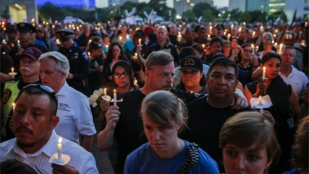 Supporters participate in the Dallas Strong Candlelight Vigil in Texas