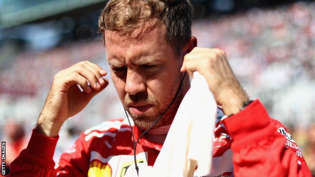 Sebastian Vettel prepares to drive on the grid before the Japan Grand Prix on October 8