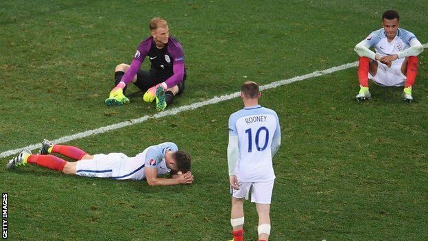 England players defeated on the floor.