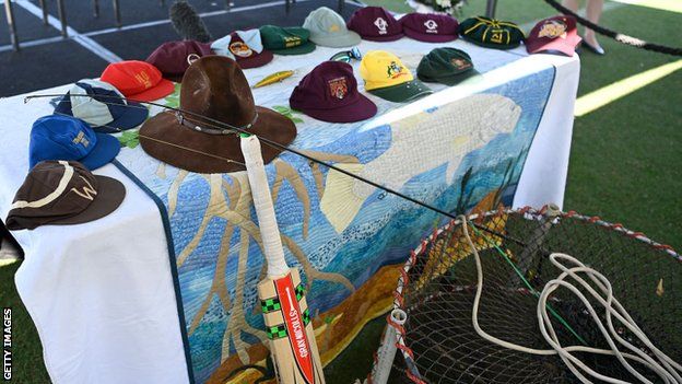 Cricket cap and fishing equipment belonging to Andrew Symonds displayed at his public memorial service