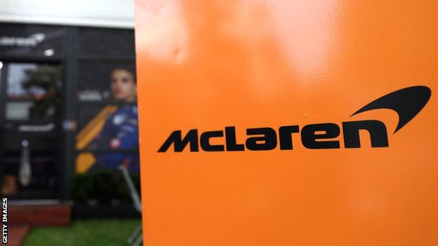 The McLaren logo on a sign at a Formula 1 Grand Prix