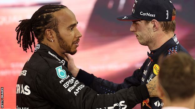 Lewis Hamilton and Max Verstappen embrace after the race.