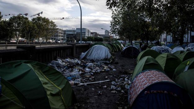 Parisians have become used to seeing make-shift camps beside the ring road at Porte de la Chapelle in north-east Paris