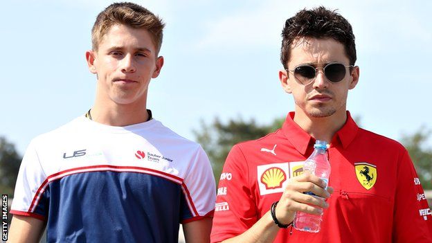 Charles Leclerc and Arthur Leclerc pictured together at the German Grand Prix in 2019