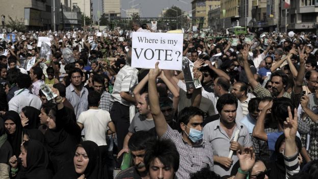 Iranian supporters of defeated presidential candidate Mir Hossein Mousavi march in Tehran on 15 June 2009