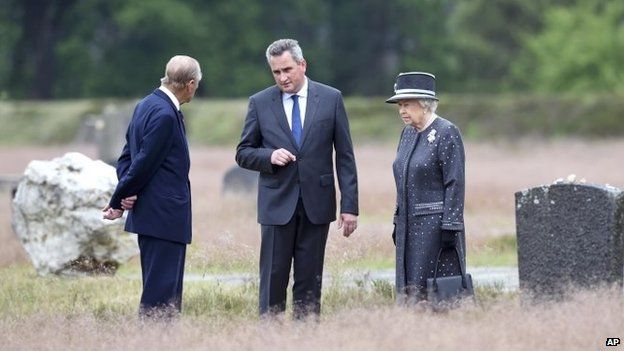 Queen and Prince Philip at Bergen-Belsen with Director of the memorial Jens-Christian Wagner.
