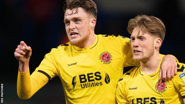 Harry Souttar and Lewis Gibson in action for Fleetwood Town