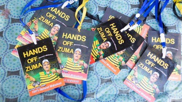 Accreditation badges for supporters of former South African President Jacob Zuma gather outside the Commission of Inquiry into Allegations of State Capture, Johannesburg, South Africa, 15 July 2019.