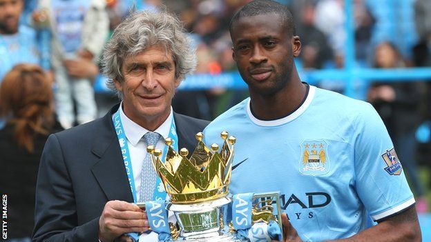 Then-Manchester City boss Manuel Pellegrini and Yaya Toure with the Premier League trophy