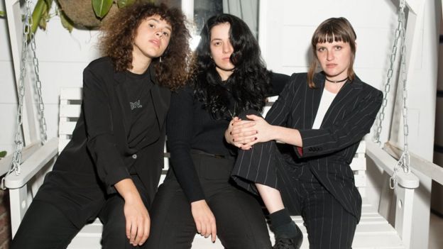 Meet Muna: The 'queer pop' band who caught Harry Styles's eye - BBC News