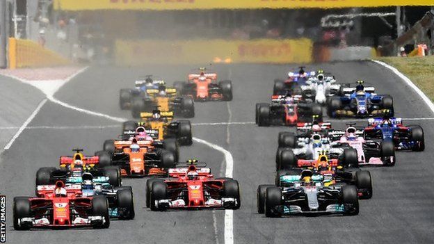 Ferrari's Sebastian Vettel and Mercedes driver Lewis Hamilton in action at the Spanish Grand Prix