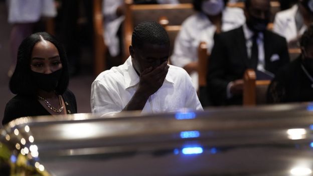 Mourners at George Floyd's coffin in Houston, 9 June
