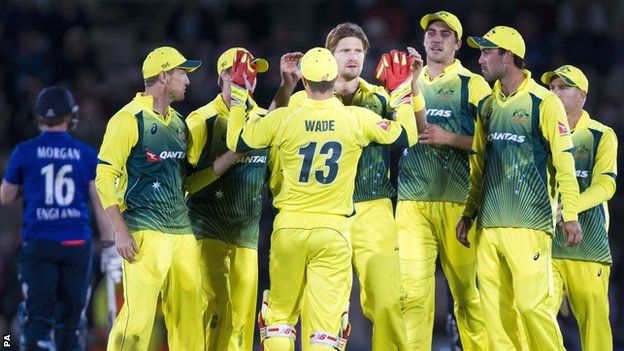 Shane Watson (centre) celebrates a wicket for Australia