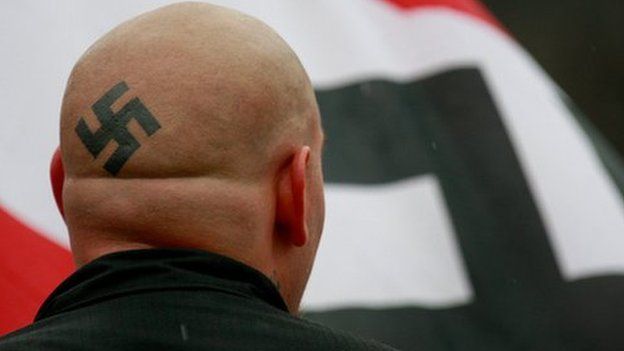 Swastika tatoo on head 19 April 2009