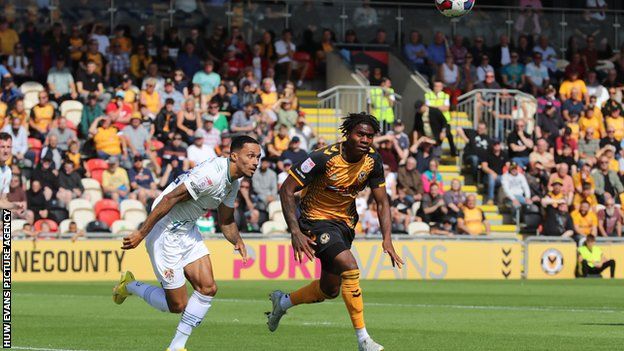 Tranmere's Josh Dacres Cogley challenges Newport debutant Thierry Nevers