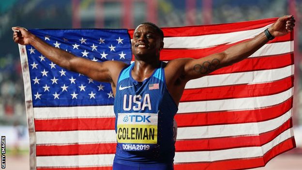 Christian Coleman celebrates his gold medal at the Doha World Championships in 2019