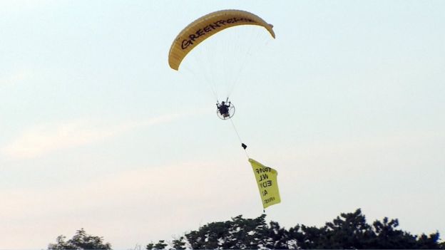 paraglider with banner near Turnberry