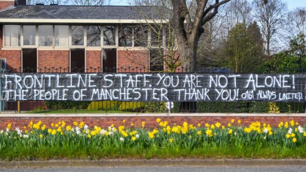 A banner supporting NHS staff is seen outside the 999 Switchboard Offices