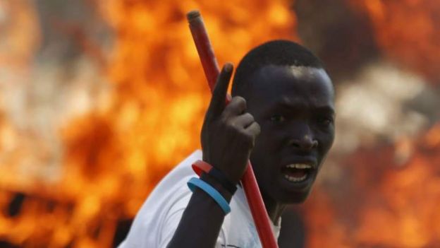 A protester in Burundi angered at President Pierre Nkurunziza's decision to run for a third term