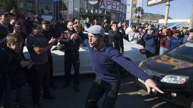 MMA supporters celebrate in the streets of Dagestan