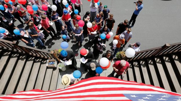 Participants march in a parade with red, white and blue balloons during a Fourth of July parade and celebration at the Motherhouse of the Daughters of Mary Convent in Round Top, New York, USA, 04 July 2017