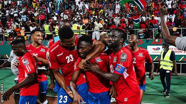 The Gambia celebrate winning against Tunisia