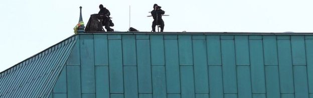 Snipers guarded the roof of Berlin's renowned hotel Adlon, which is hosting President Erdogan