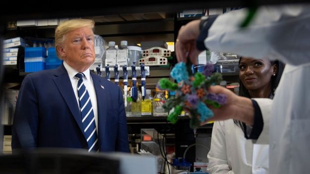 Trump speaking to scientists at a vaccine research centre