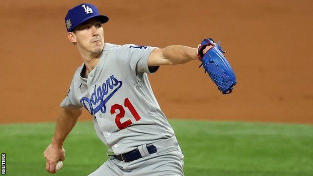 Los Angeles Dodgers pitcher Walker Buehler throws in game three of the MLB World Series